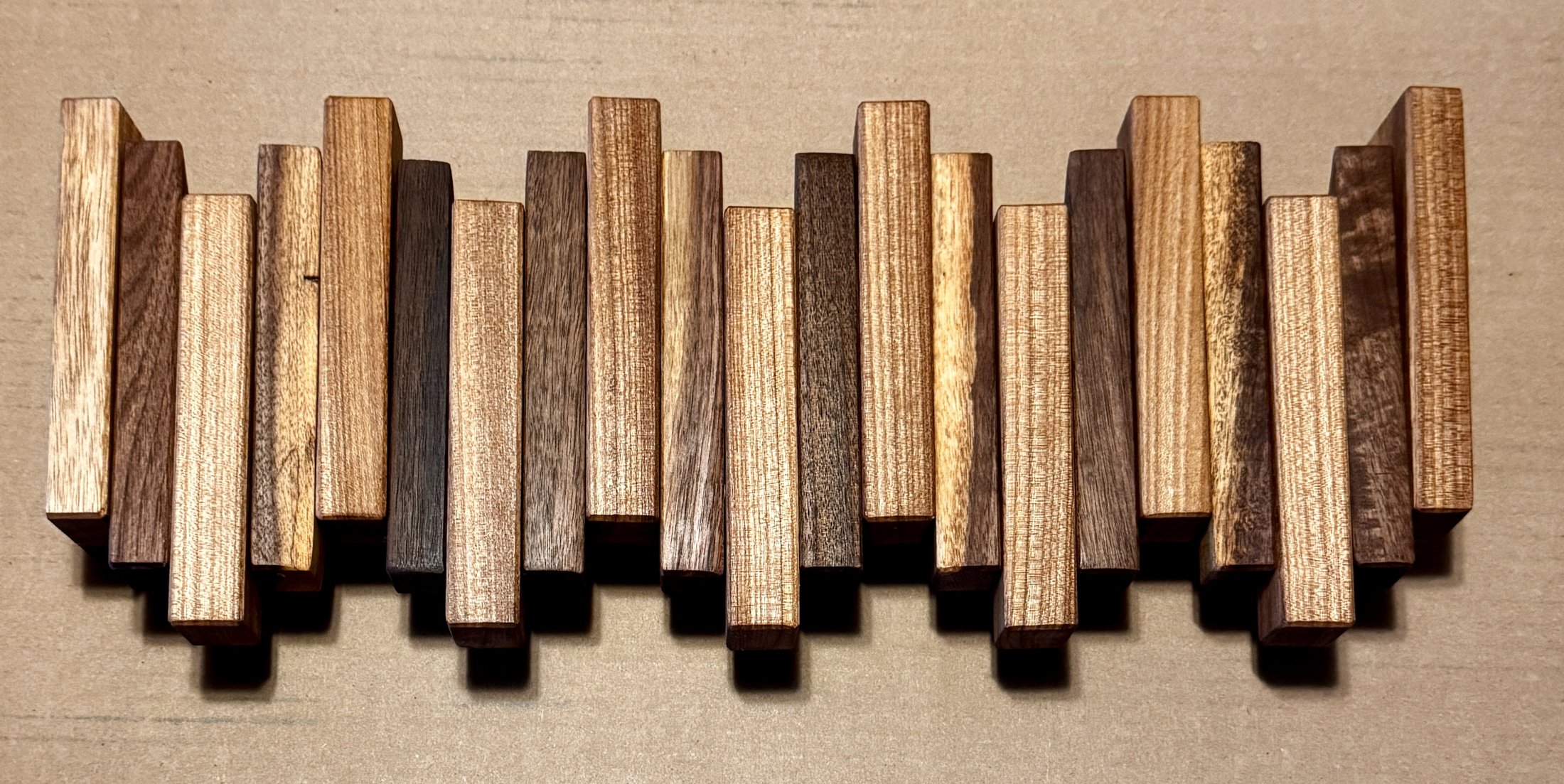 Walnut and elm piano-key flip-down wall rack — flagship Western Berks Woodworks piece